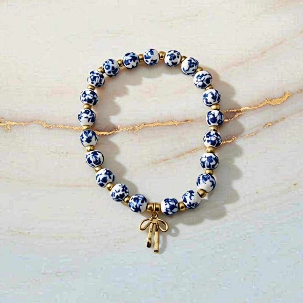 Blue and White Porcelain Beaded Bracelet with Red Bow Charm