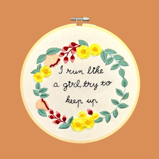 Feminist embroidery hoop art by Andrea Perez Acevedo CraftnCrumble LLC handmade in Cedar Rapids Iowa with floral design