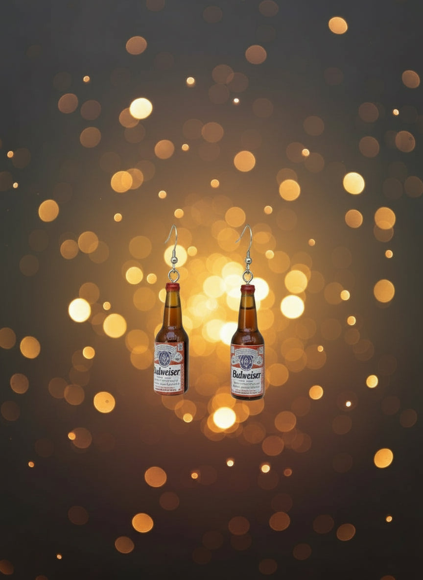 Pair of Budweiser bottle-shaped earrings on a display card with a white background
