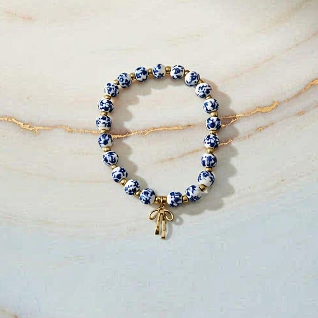 Blue and White Porcelain Beaded Bracelet with Red Bow Charm
