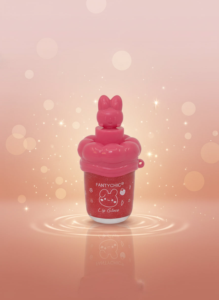 FANTYCHIC Gloss Lip Shine clear sparkle lip gloss in a stylish pink rabbit tube with sparkling background.