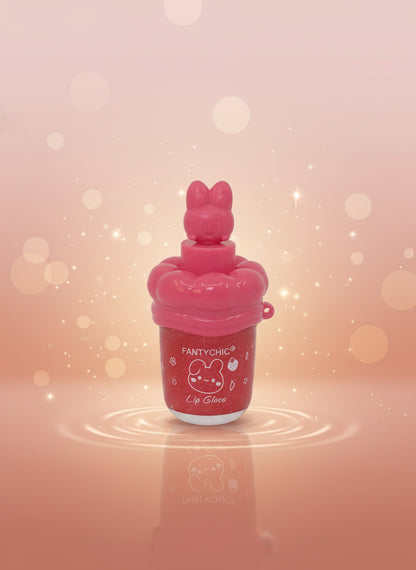 FANTYCHIC Gloss Lip Shine clear sparkle lip gloss in a stylish pink rabbit tube with sparkling background.