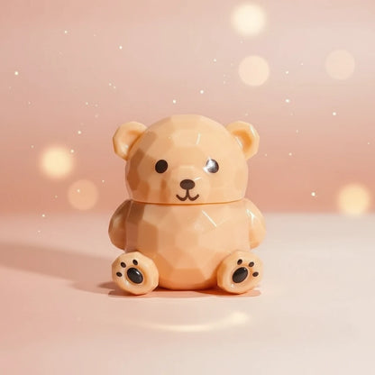 Bear Magic Lip Balm in an adorable bear-shaped container, offering color-changing lip gloss that adapts to you.