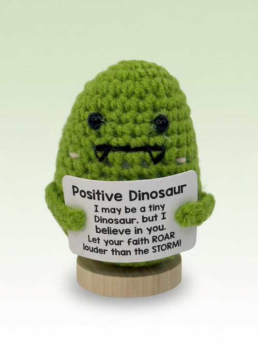 Emotional support dinosaur plushie with a sign encouraging positivity and love, perfect for emotional support.
