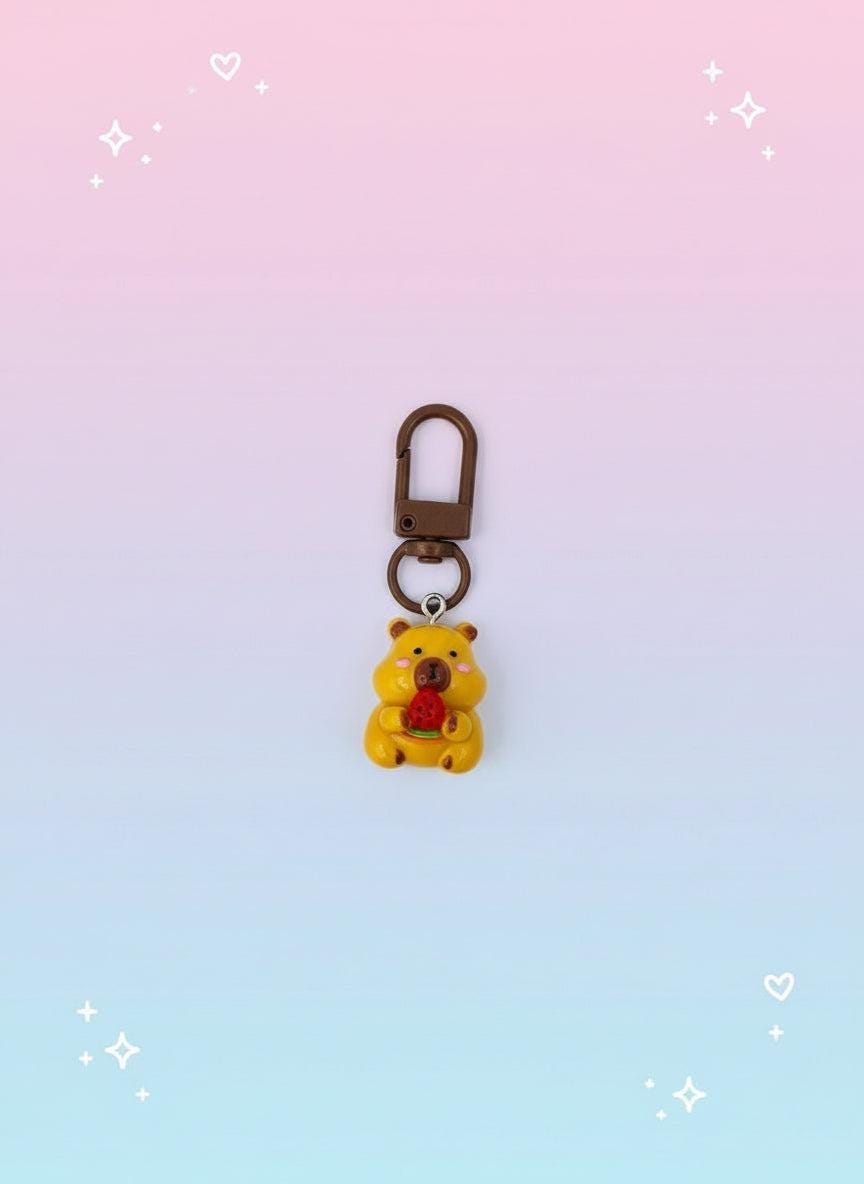 Keychain in clear packaging with &#39;Sweetie&#39; label on pink background