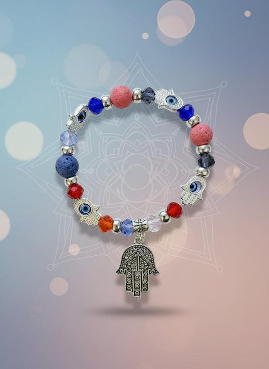 Colorful beaded bracelet with charms on a white background