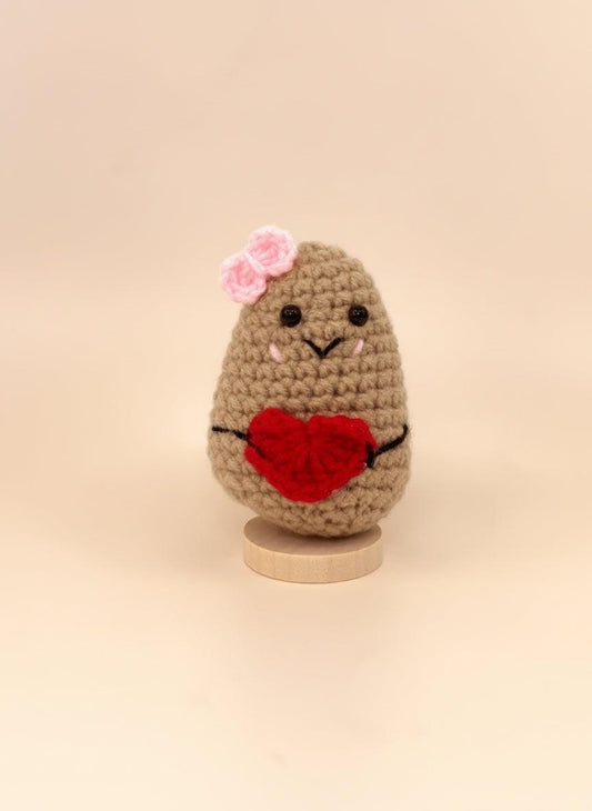 Emotional support potato plushie with a heart, handmade, soft yarn, brings comfort and humor to your day.