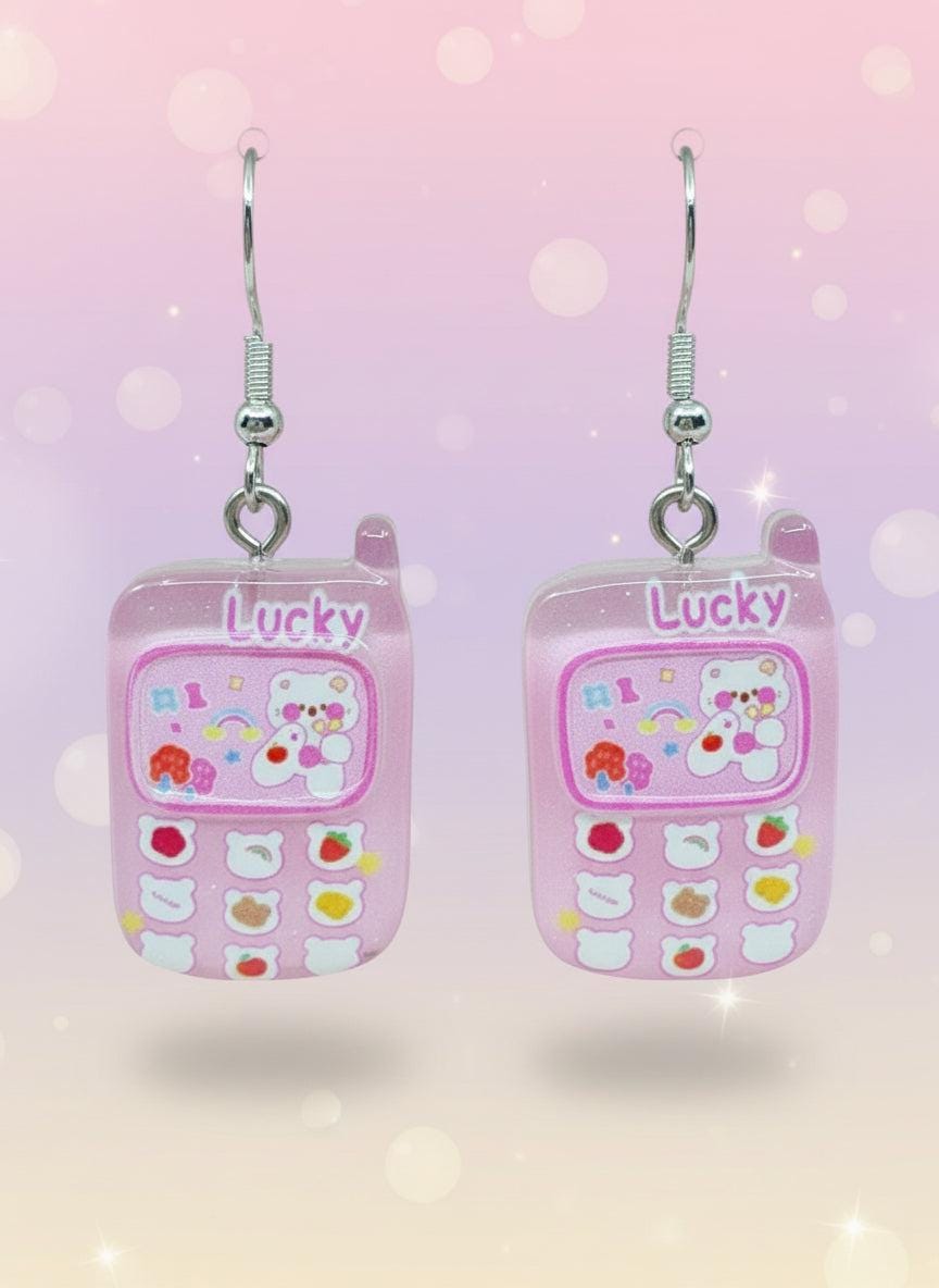 Adorable Kawaii Phone Earrings in pink with colorful cartoon design and glossy finish, perfect for cute fashion lovers.